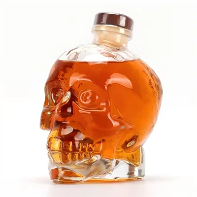 Бутылка с водкой и головой скелета